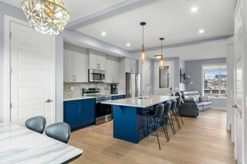 3 Sundown Manor, Cochrane, AB - Indoor Photo Showing Kitchen With Stainless Steel Kitchen With Upgraded Kitchen