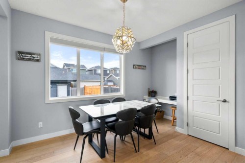 3 Sundown Manor, Cochrane, AB - Indoor Photo Showing Dining Room