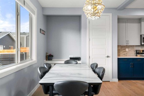 3 Sundown Manor, Cochrane, AB - Indoor Photo Showing Dining Room