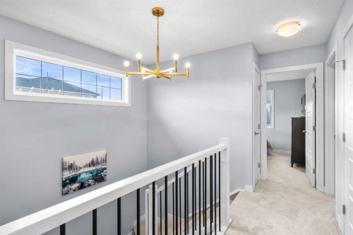 3 Sundown Manor, Cochrane, AB - Indoor Photo Showing Other Room