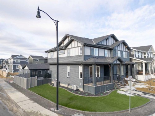 3 Sundown Manor, Cochrane, AB - Outdoor With Deck Patio Veranda With Facade