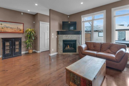 2534 3 Avenue Nw, Calgary, AB - Indoor Photo Showing Living Room With Fireplace