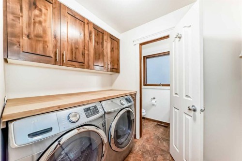 17140 Sundown Road Se, Calgary, AB - Indoor Photo Showing Laundry Room