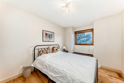 17140 Sundown Road Se, Calgary, AB - Indoor Photo Showing Bedroom