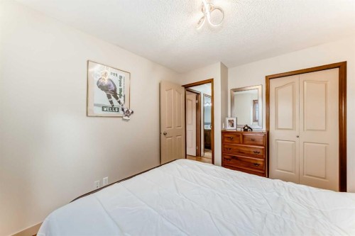 17140 Sundown Road Se, Calgary, AB - Indoor Photo Showing Bedroom