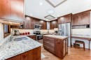 17140 Sundown Road Se, Calgary, AB  - Indoor Photo Showing Kitchen With Double Sink 