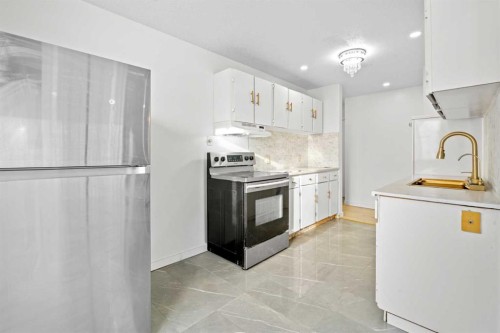 201-4328 4 Street Nw, Calgary, AB - Indoor Photo Showing Kitchen