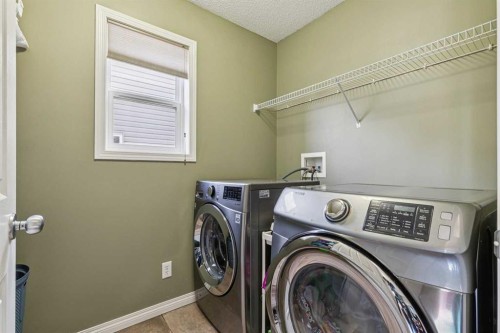 460 Silverado Plains Circle Sw, Calgary, AB - Indoor Photo Showing Laundry Room