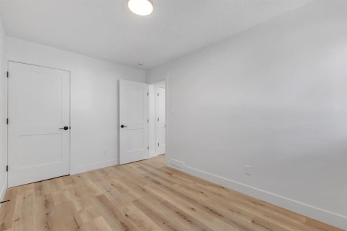 208 Cedarille Green Sw, Calgary, AB - Indoor Photo Showing Other Room