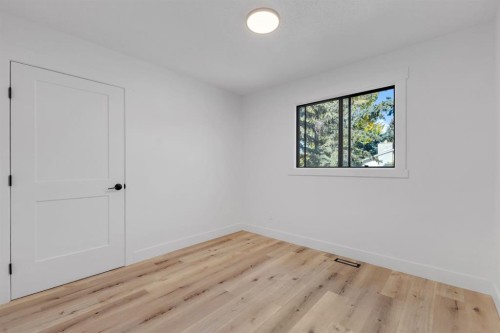 208 Cedarille Green Sw, Calgary, AB - Indoor Photo Showing Other Room