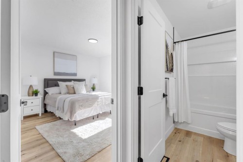 208 Cedarille Green Sw, Calgary, AB - Indoor Photo Showing Bedroom