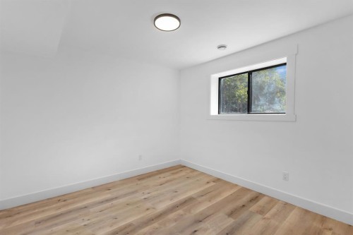 208 Cedarille Green Sw, Calgary, AB - Indoor Photo Showing Other Room