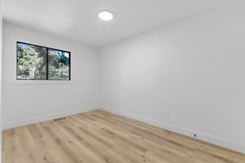 208 Cedarille Green Sw, Calgary, AB - Indoor Photo Showing Other Room