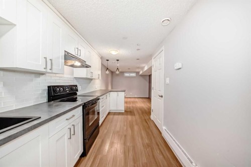 611 Meota Road Ne, Calgary, AB - Indoor Photo Showing Kitchen