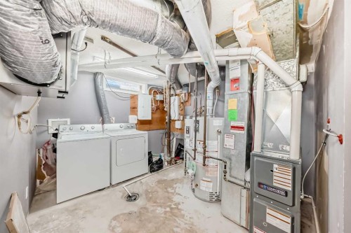 611 Meota Road Ne, Calgary, AB - Indoor Photo Showing Laundry Room