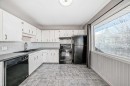 611 Meota Road Ne, Calgary, AB  - Indoor Photo Showing Kitchen With Double Sink 