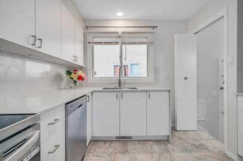 11155 Sacramento Drive Sw, Calgary, AB - Indoor Photo Showing Kitchen With Double Sink