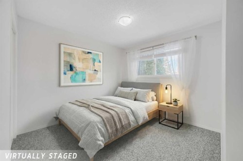 11155 Sacramento Drive Sw, Calgary, AB - Indoor Photo Showing Bedroom