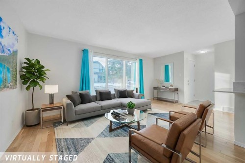 11155 Sacramento Drive Sw, Calgary, AB - Indoor Photo Showing Living Room