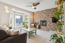 3406 Cedarille Drive Sw, Calgary, AB  - Indoor Photo Showing Living Room With Fireplace 