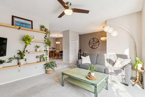 3406 Cedarille Drive Sw, Calgary, AB - Indoor Photo Showing Living Room