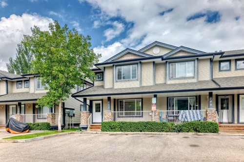252 Stonemere Place, Chestermere, AB - Outdoor With Deck Patio Veranda With Facade