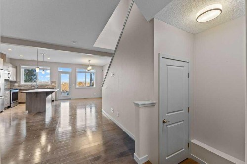 251 Sunrise View, Cochrane, AB - Indoor Photo Showing Other Room