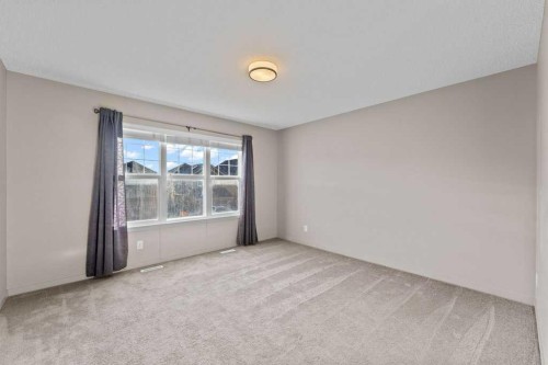 251 Sunrise View, Cochrane, AB - Indoor Photo Showing Other Room