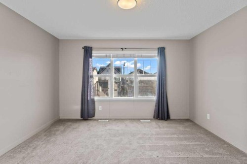 251 Sunrise View, Cochrane, AB - Indoor Photo Showing Other Room