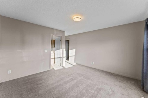 251 Sunrise View, Cochrane, AB - Indoor Photo Showing Other Room