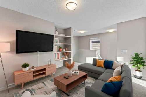 251 Sunrise View, Cochrane, AB - Indoor Photo Showing Living Room