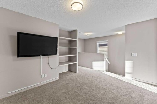 251 Sunrise View, Cochrane, AB - Indoor Photo Showing Other Room