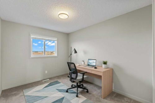 251 Sunrise View, Cochrane, AB - Indoor Photo Showing Office