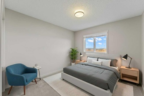 251 Sunrise View, Cochrane, AB - Indoor Photo Showing Bedroom