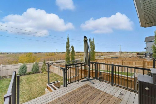 251 Sunrise View, Cochrane, AB - Outdoor With Deck Patio Veranda With Exterior