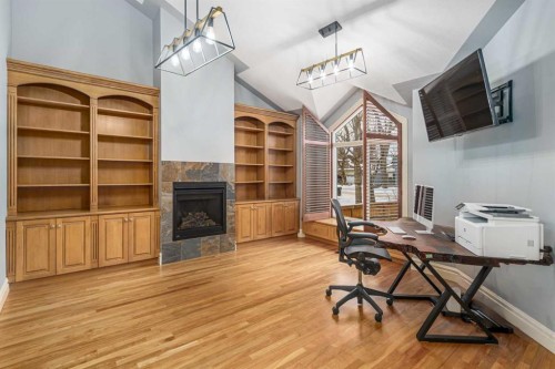 6002 Bow Crescent Nw, Calgary, AB - Indoor Photo Showing Office With Fireplace