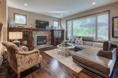 465 Marina Drive, Chestermere, AB - Indoor Photo Showing Living Room With Fireplace
