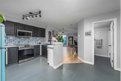 1004-1121 6 Avenue Sw, Calgary, AB - Indoor Photo Showing Kitchen With Upgraded Kitchen