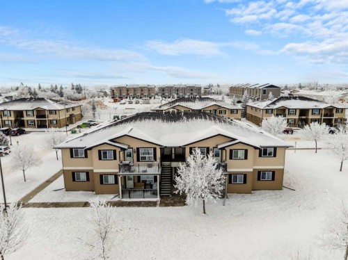 407-8 Bayside Place, Strathmore, AB - Outdoor With Facade