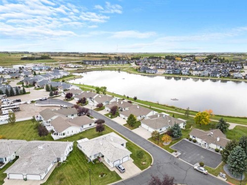 407-8 Bayside Place, Strathmore, AB - Outdoor With Body Of Water With View