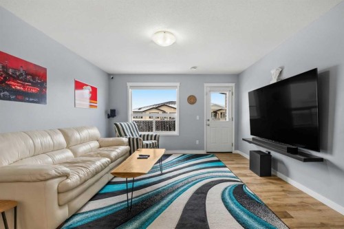 407-8 Bayside Place, Strathmore, AB - Indoor Photo Showing Living Room