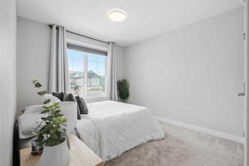 86 Legacy Woods Place Se, Calgary, AB - Indoor Photo Showing Bedroom