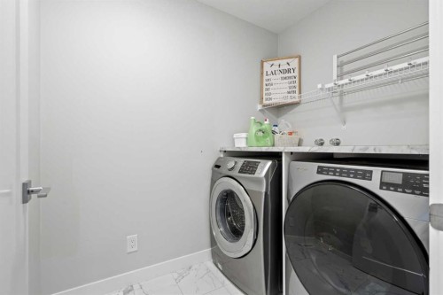 86 Legacy Woods Place Se, Calgary, AB - Indoor Photo Showing Laundry Room