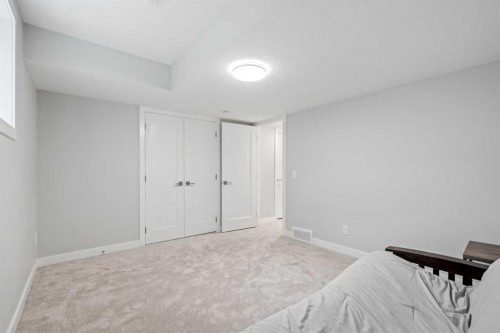 86 Legacy Woods Place Se, Calgary, AB - Indoor Photo Showing Bedroom