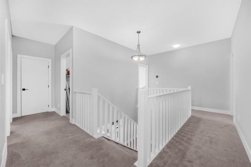 155 Carringham Way Nw, Calgary, AB - Indoor Photo Showing Other Room