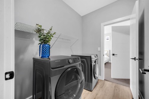 155 Carringham Way Nw, Calgary, AB - Indoor Photo Showing Laundry Room