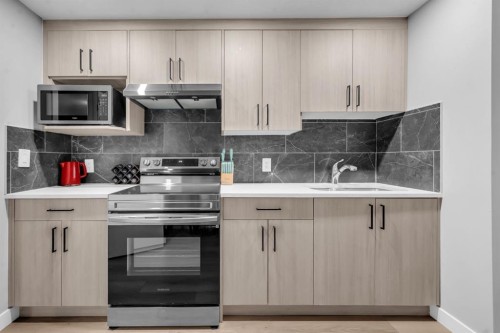 155 Carringham Way Nw, Calgary, AB - Indoor Photo Showing Kitchen