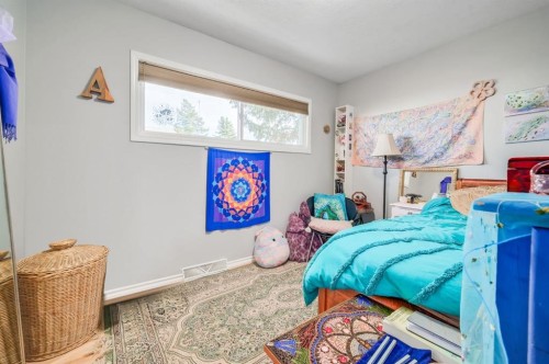 92 2A Street, High River, AB - Indoor Photo Showing Bedroom