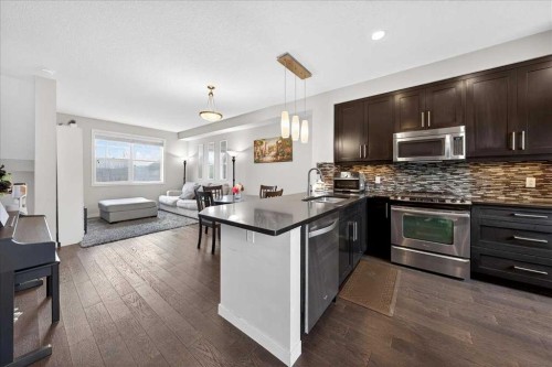 11 Nolan Hill Boulevard Nw, Calgary, AB - Indoor Photo Showing Kitchen With Upgraded Kitchen
