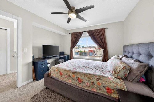 11 Nolan Hill Boulevard Nw, Calgary, AB - Indoor Photo Showing Bedroom